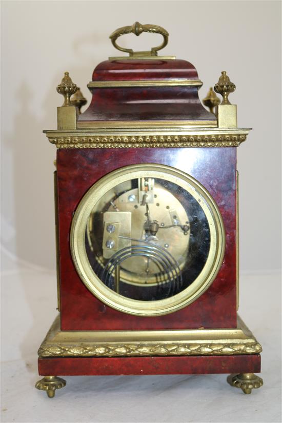 A Victorian ormolu mounted tortoiseshell mantel clock, 11.5in.